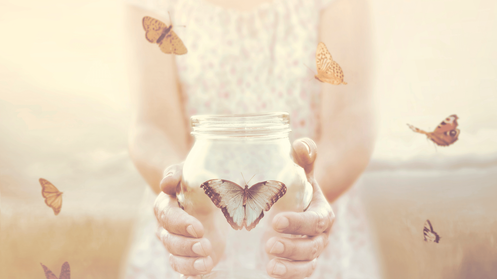 girl holding a jar of butterflies